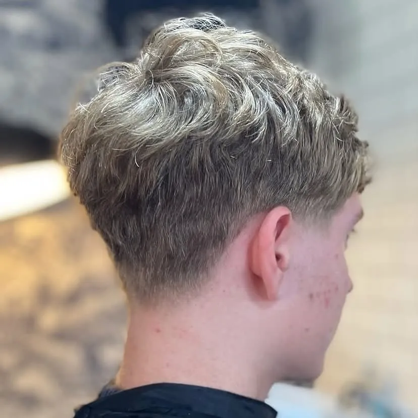 Men's textured crop with taper by Hair By Henry